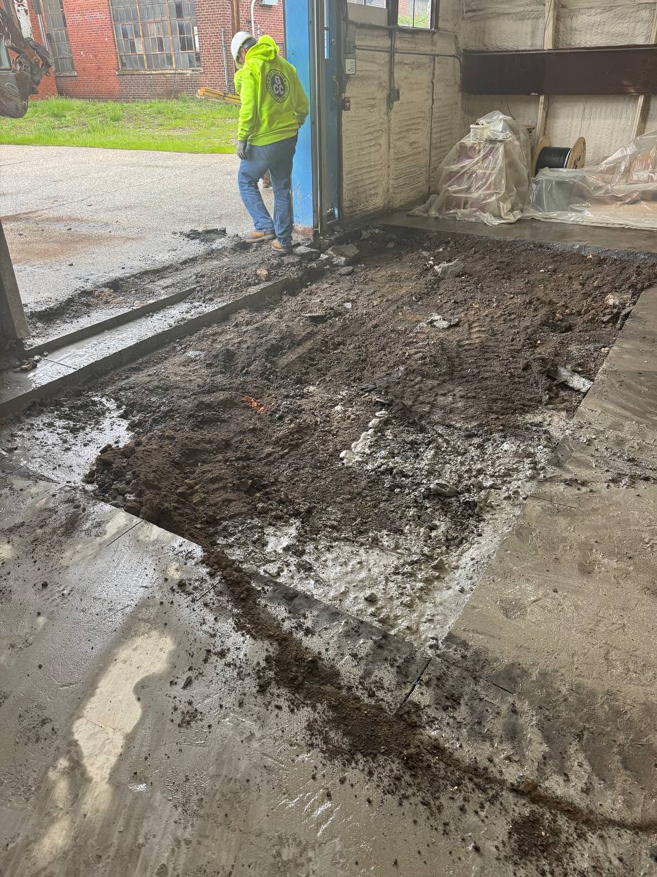 Controlled concrete slab removal and small demolition at industrial warehouse facility